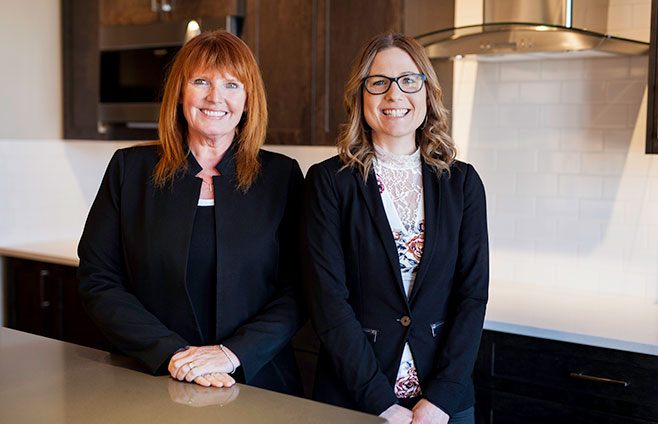 Elaine McKee-Doel (left), President, and Heather Yates (right), Sales Manager of McKee Homes.